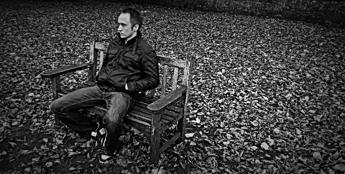 Jamie, sat on a bench.