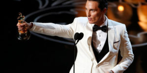 Matthew McConaughey accepts the Oscar for best actor for his role in "Dallas Buyers Club" at the 86th Academy Awards in Hollywood, California March 2, 2014